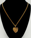 24" gold tone chain with locket