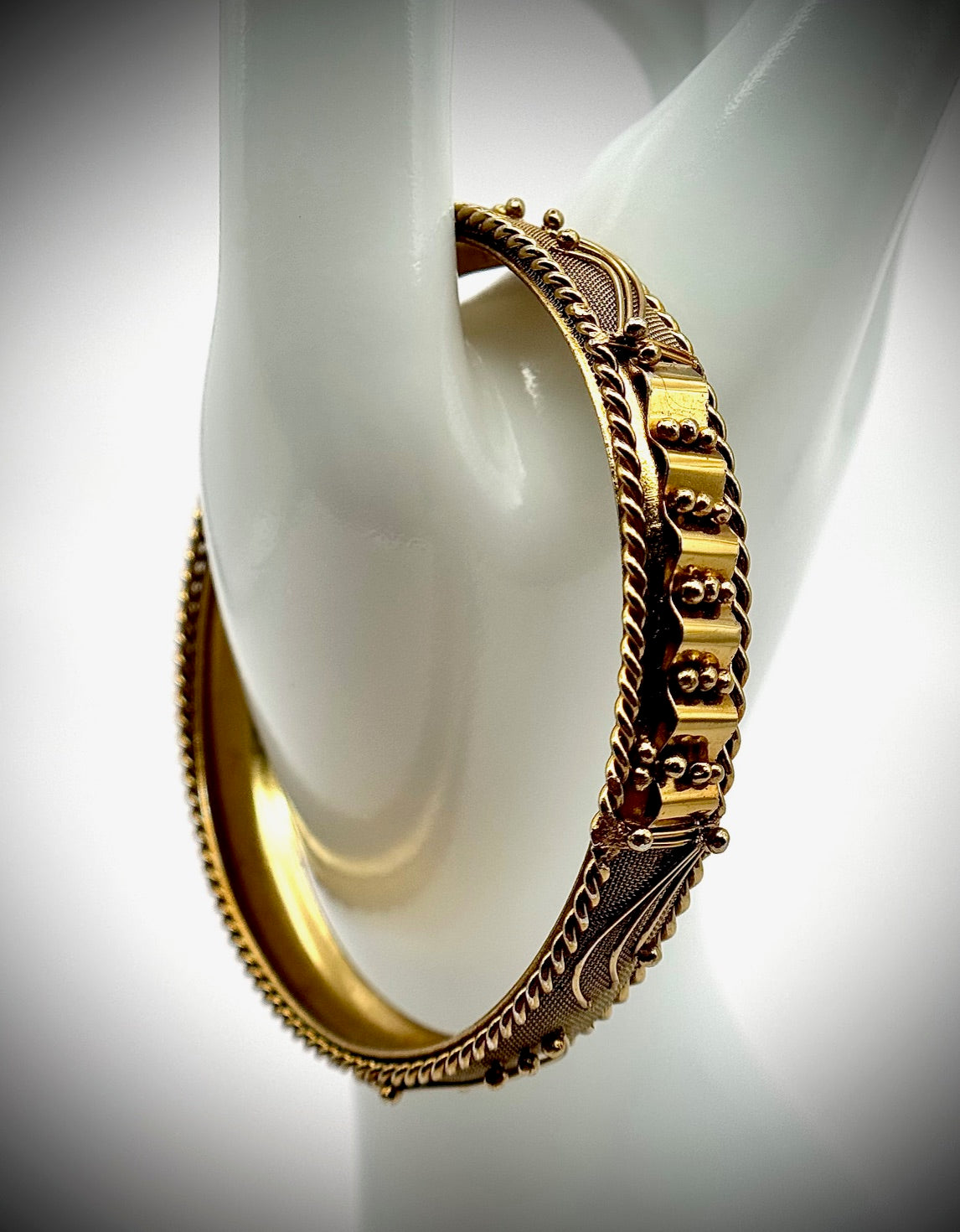 gold tone bangle bracelet ornate scroll and mesh design