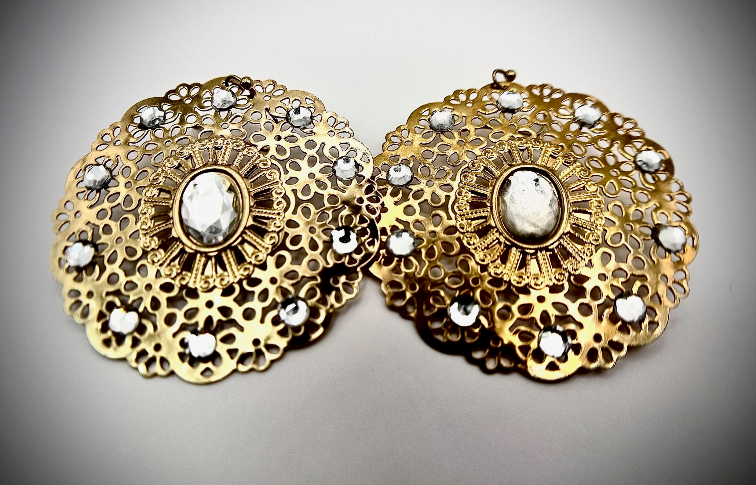 gold tone round lacy filigree earrings